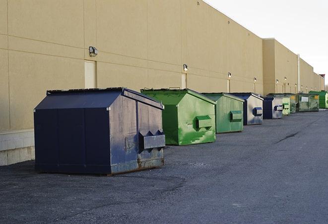 dumpsters lined up for use on busy construction site in Chesterland